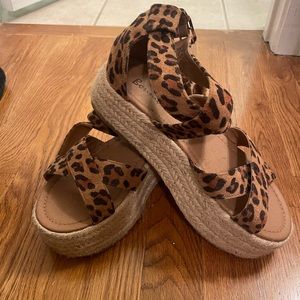 ADORABLE cheetah espadrilles, with tan footbed and cork bottom! NEVER WORN!